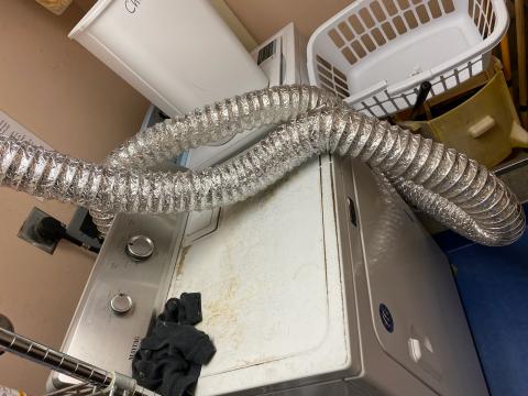 White and silver plastic flex in a dryer in Raleigh, cary, Durman 